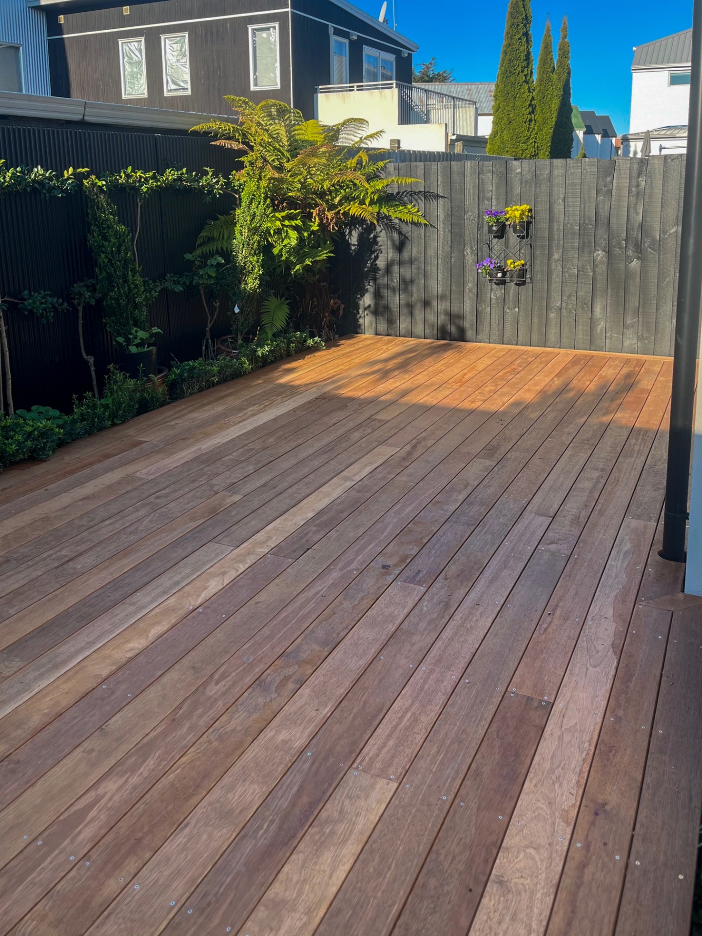 Large hardwood entertaining deck in a sunny Canterbury courtyard
